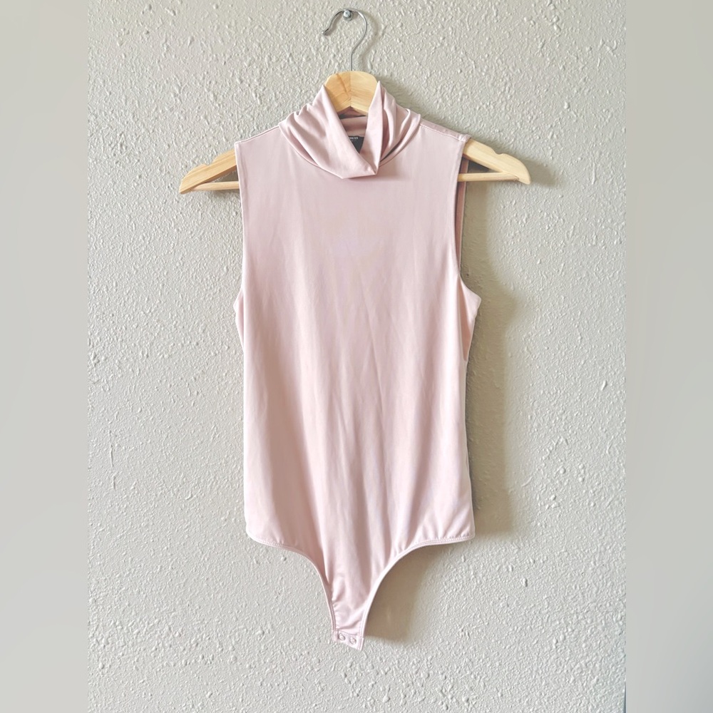 Express Body Contour Body Suit in pink, size small.